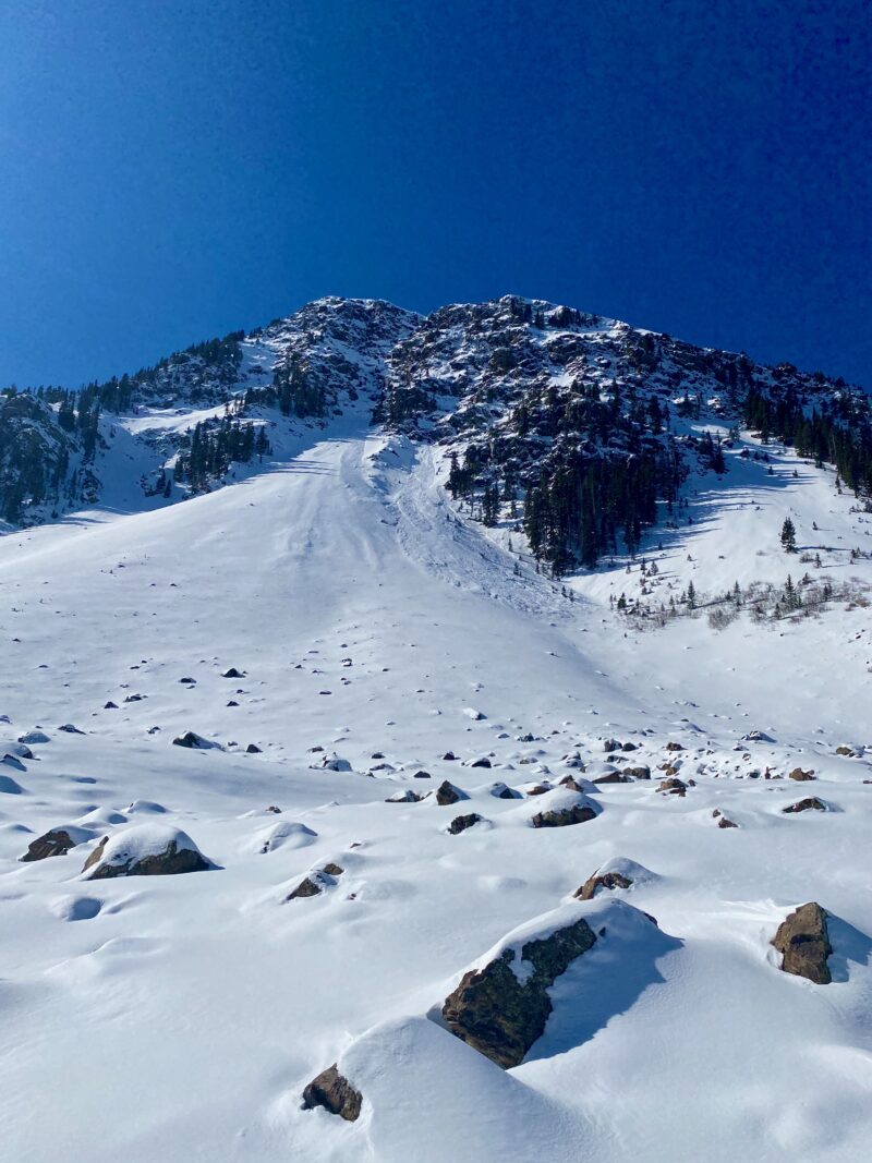 Small natural avalanche from 11/24/20 that started up high as loose snow in the rocks and stepped down into older weak layers.  East aspect at 11,600'