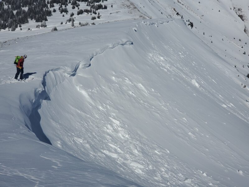 Fresh cornices were failing and triggering small avalanches off the leeward sides of ridges. 