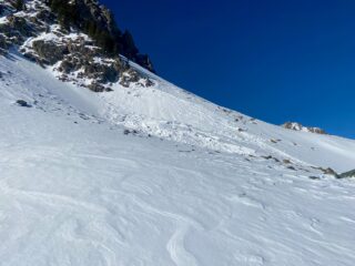 Natural Hard Slab avalanche over the last 48 hours that happened on a cross-loaded gully on a SE aspect above treeline from the N / ENE winds since 12/2
