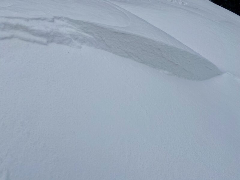 Example of a small isolated pocket of wind slab that we were able to release from the ridgeline. Notice that this slab failed within the transported snow and not on a buried weak layer of facets. This is an important distinction.