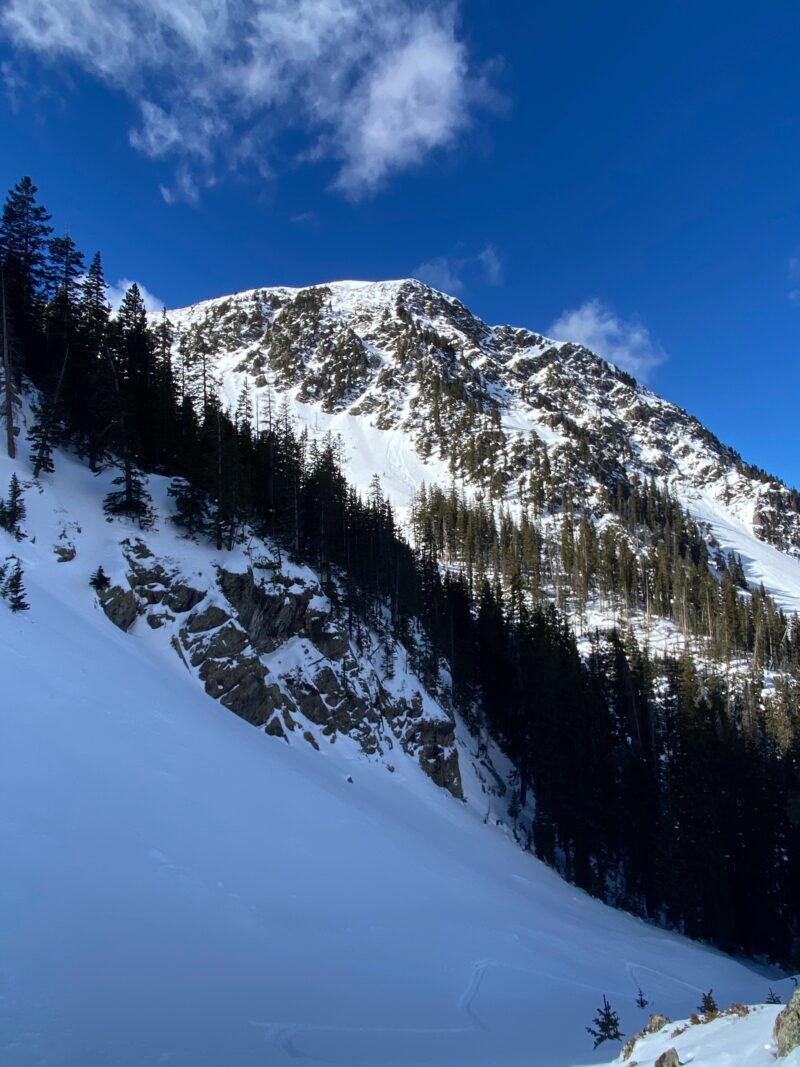 Small loose snow avalanche beneath the cliffs from 12/21