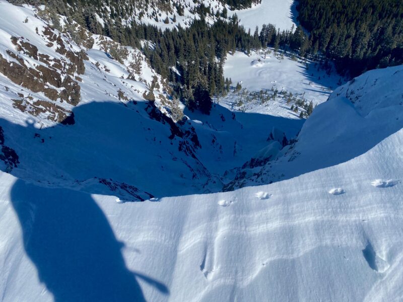 Overhanging cornice looks to have collapsed today, as the animal prints look fresh and there are large cornice chunks far down in the runout