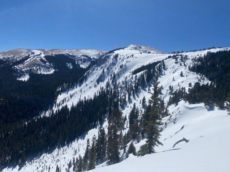 Steep terrain like this on East aspects have seen loading from recent snow and strong winds forming wind slabs on top of Crusts