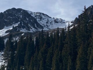 Dec 22, 2021: Lake Fork Peak (NNE aspect) has some of the most continuous snow in the range.  These northerly and east-facing slopes will become increasingly dangerous with new snow in the forecast adding a slab on top of a weak faceted snowpack