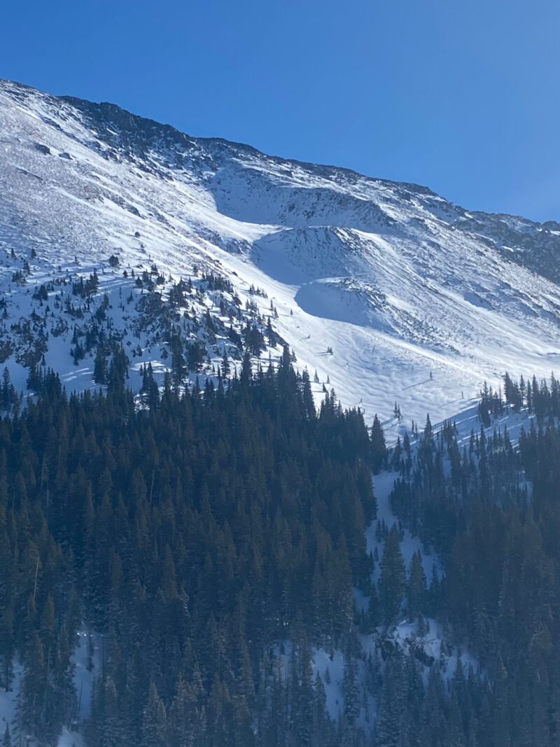 West aspect on Wheeler Peak with wind loaded snow in the cross-loaded gully