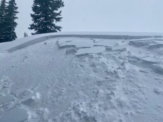 Small remotely triggered wind slab avalanche near treeline on a slope that was actively loading.  It was roughly 50' wide and about 1' foot deep Size 1.  