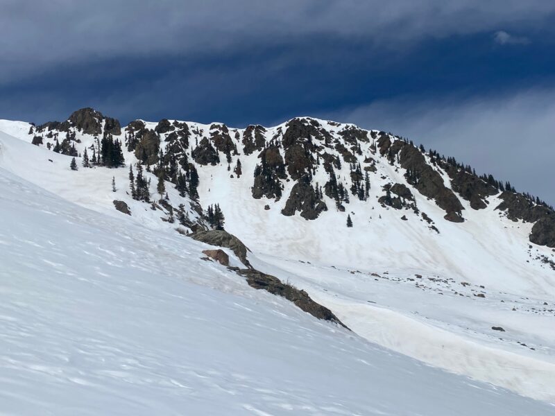 Warm temperatures and sunny skies over the last several days has resulted in a shrinking snowpack and melt-freeze crusts that quickly soften up throughout the day.  There is an obvious dust layer that formed from the 2/22 wind event that is now visible on many solar aspects.