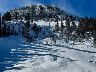 Jan 9, 2024: NE aspect where a larger avalanche that started up top above the rock band deposited debris into the flats.  East/NE aspects are continuing to load with west wind today into tomorrow.  