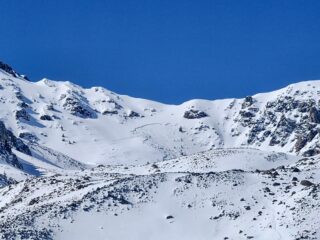 Feb 19, 2025: A rider-triggered avalanche on the Northeast Face of Lake Fork Peak.  This avalanche broke 2-3 feet deep and hundreds of feet wide.  We're really glad to know that no one was harmed in this event, but it's another strong piece of evidence that much of our North and East-facing terrain is primed for dangerous human-triggered persistent slab avalanches.