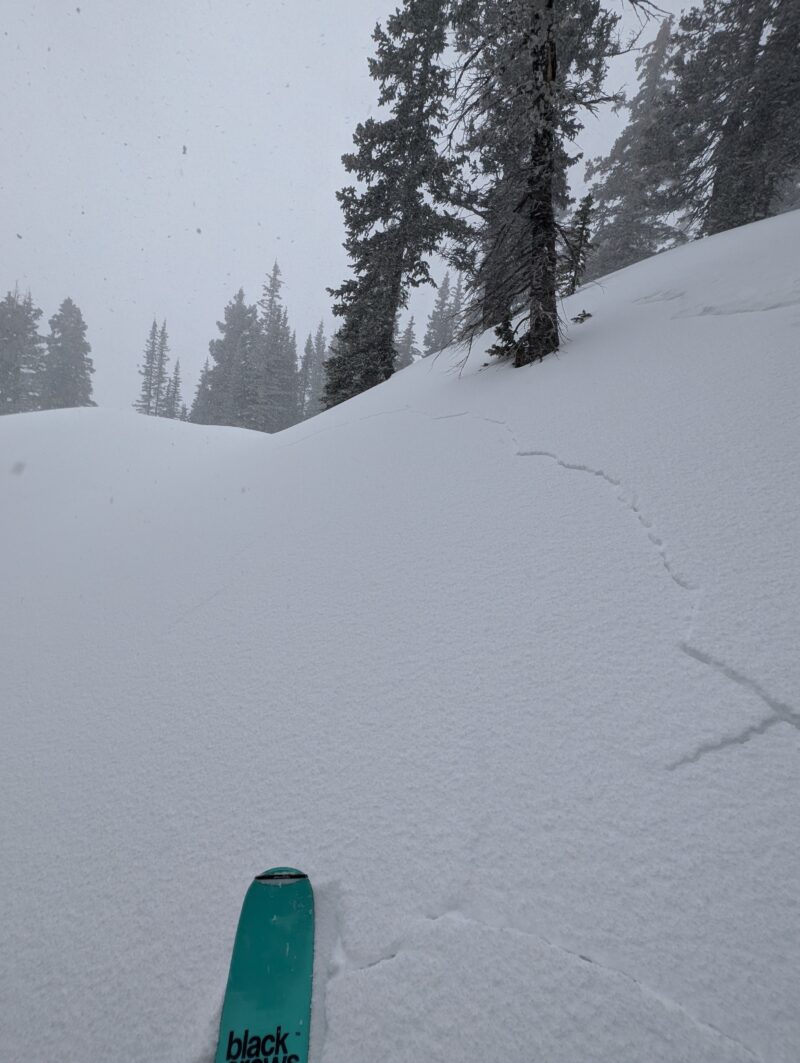 A photogenic shooting crack in a small wind-drifted area with a deeper slab on the surface.