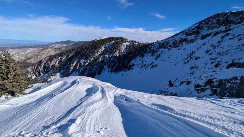 Wind drifted snow along the ridge, w/ the surface indicating the north winds we experienced as the last storm blew out of our area.