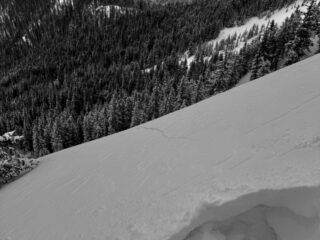 Feb 14, 2026: Shooting cracks over 100 feet and collapsing were widespread in travels today especially near and above treeline where moderate winds during the storm created a more cohesive slab. You'll see where this started the ski penetration was close to the ground in depth hoar. 